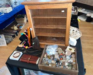 Eddie Bauer leather wallet, tray full of rocks/gems & small display case.