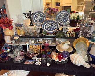 Table full of porcelain and glassware