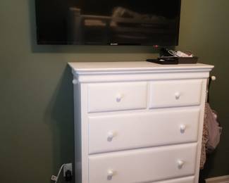 Wall mount flat screen TV; tall dresser