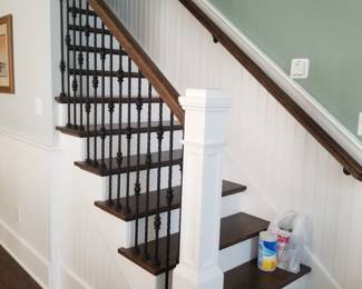 Stairway; wrought iron spindles; wainscotting
