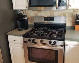 Frigidaire gas range. Frigidaire microwave oven mfg, March 2018. Keurig coffeemaker