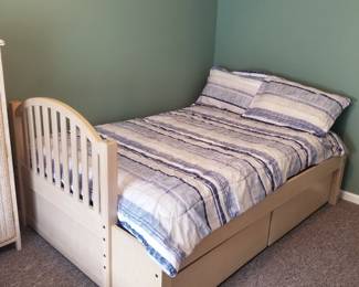 Full bed converts to the bottom of a bunk bed set; features storage drawers