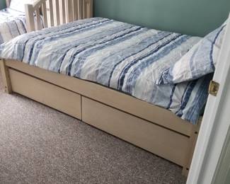 Full bed converts to the bottom of a bunk bed set; features storage drawers