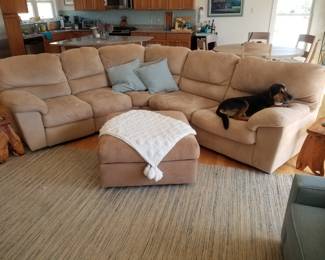 Fabulous sectional couch is a sleeper sofa with a recliner on one side!