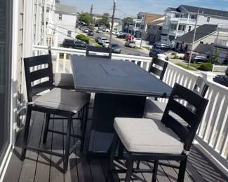 High top bar set with central firepit seats 6