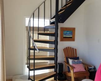 Gorgeous spiral staircase with wood treads
