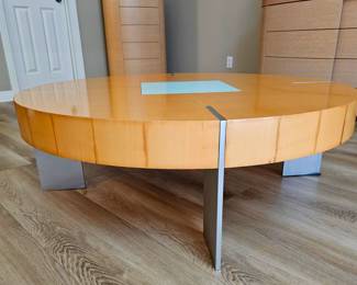 Circular Coffee Table With Metallic Structure.