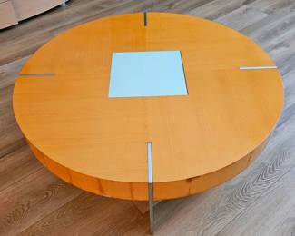 Circular Coffee Table With Metallic Structure.