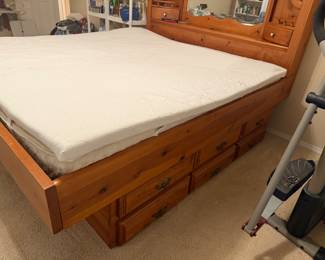 King sized bed with 6 drawers underneath.