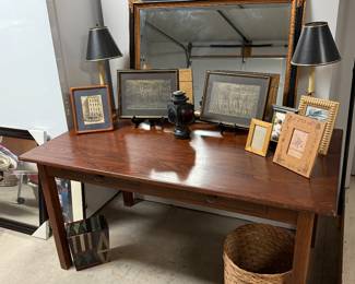 Library desk/table
Large mirror
Lantern
Picture frames
Pair of lamps
Wicker basket
Artwork