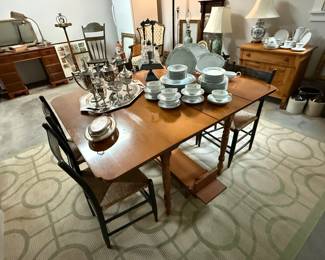 Drop leaf cherry table with extra leaves and table pads