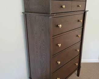 A Six Drawer Tall Dresser.