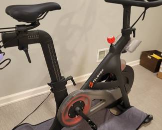 Peloton Stationary Bike PLTN RV1BQ with Shoes and extra seat.