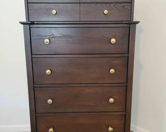 A Six Drawer Tall Dresser.