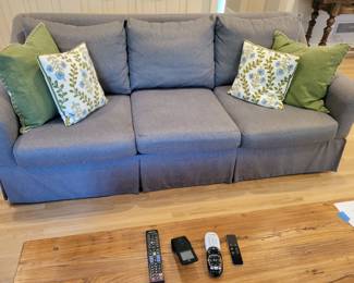 A Three Seat Sofa by Sam Moore.