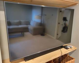 65" Samsung TV and Soundbar.