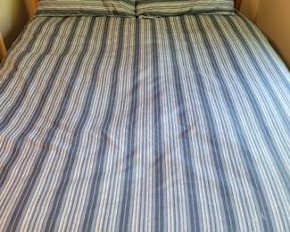 A Full Size Bed. The comforter is not for sale.