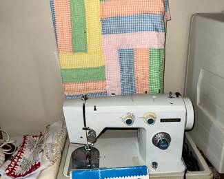 Several different sewing machines
