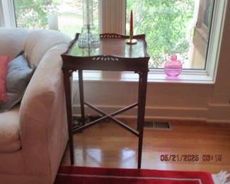 One of two side tables