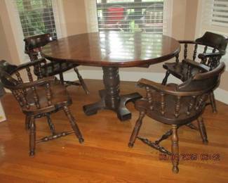 Table with leaf and 4 captain's chairs