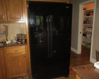 Side by side Whirlpool refrigerator (less than 2 yrs old)