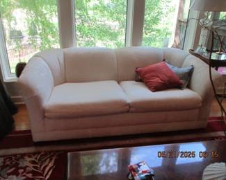 One of two Selig love seats