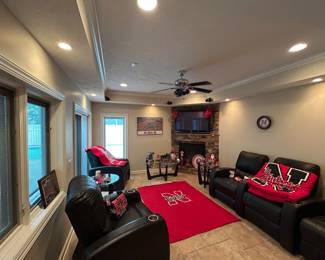 Black electric recliners and theater seating
Glass top matching end tables and coffee table