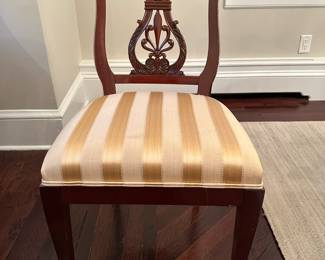 Classic wooden dining table - close up of side chairs (there are 6 in total) and 2 armchairs.