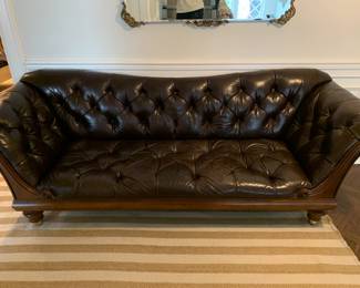 Brown leather Chesterfield couch with wooden frame - asking $700. Excellent condition. 102" wide, 32" deep, 36" high. Located on first floor of home for easier moving.