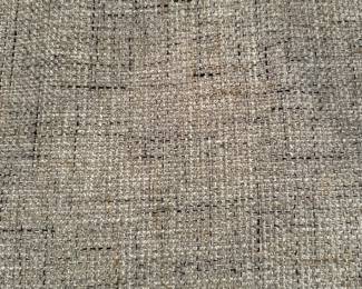 Close up photo of fabric for 2 gray couches.