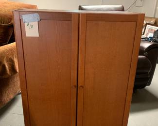 Wooden cabinet with 2 adjustable shelves....see additional photo for the inside shelves. 31" wide x 42" tall ($10).