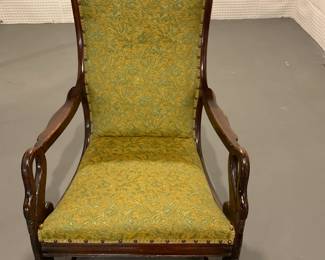 Green upholstered seat with carved wooden frame ($75). The chair is in excellent condition, but there are some scratches on the wood frame. The widest part of the seat measures 21" wide and 19" deep. The back of the chair is 40" high.