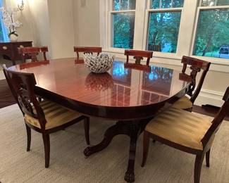 Classic wooden oval-shaped dining table with eight matching chairs (6 side chairs, 2 armchairs). Asking $1500. Includes 3 leaves in total (the photo shows table with one leaf - there are 2 more). Also includes table pad. The table is 5 feet wide and with the leaves can be extended up to 10.5 feet. Perfect for hosting large family dinners. We are selling this because we are moving. The pickup location is in Ridgewood NJ. Note: One of the armchairs has a broken arm, but it can be repaired.