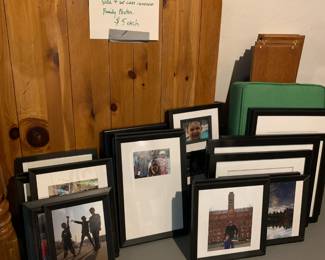 Black frames with white matte - assorted sizes - $5 each. All are in great condition. We will remove personal photos.