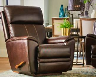 Lazy Boy Talladega dark brown leather rocker recliner.
Like new condition - asking $600. This is an oversized rocker recliner for taller people (6'3" & up) to support your legs when reclined. This recliner has power controls to operate the recliner. It also includes a port to charge your phone. See additional photos for details including measurements. Note: The chair has already been disassembled into 3 pieces to make it easier to transport.