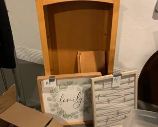 Book case with 3 shelves - $20. Family framed picture $5. Framed piece with clothes pins to hang photos/notes $5.