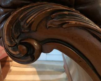 Chesterfield leather couch - close up of wooden frame.