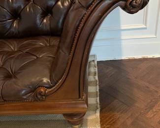 Chesterfield leather couch - close up of arm.