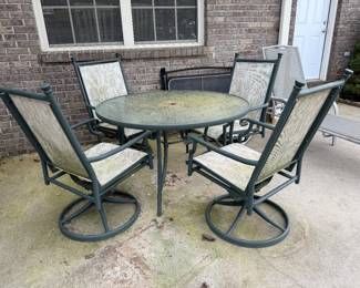 #48 Patio table with 4 bouncy swivel chairs $80.00