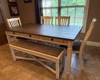 #22 Table 72x40x31 with 4 chairs and a bench $250.00