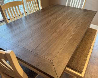 #22 Table 72x40x31 with 4 chairs and a bench $250.00