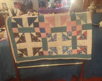 Vintage quilt and rack
