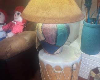 Aztec lamp with matching shade and an authentic drum with this drumstick. There are two of these.