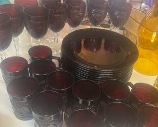 Beautiful Ruby red dishes, wine, glasses, and drinking cups