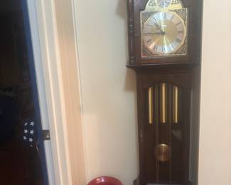 Grandmother clock and painted milk can