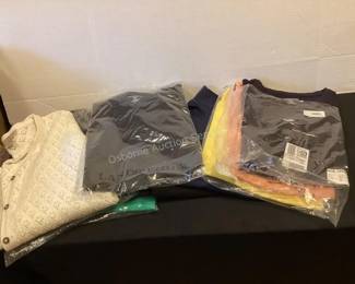 Several like new & new clothing lots.