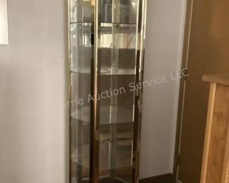 Gold tone curio cabinet