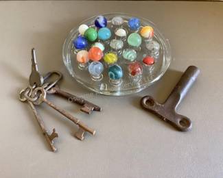 Marbles, skeleton keys, clock key