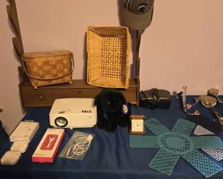 Gun or Fishing Pole Rack; Electronics; TYM Mini Projector; Baskets; Michigan State Baseball Cap, Ear Buds - New & Used; Clocks; Shoe Stretchers and More. 