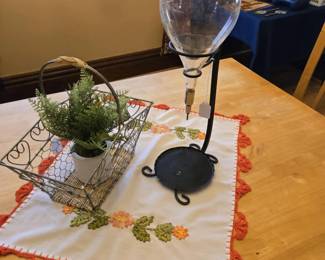Embroidered Table Linen; Wire Basket; Faux Plants and much more!